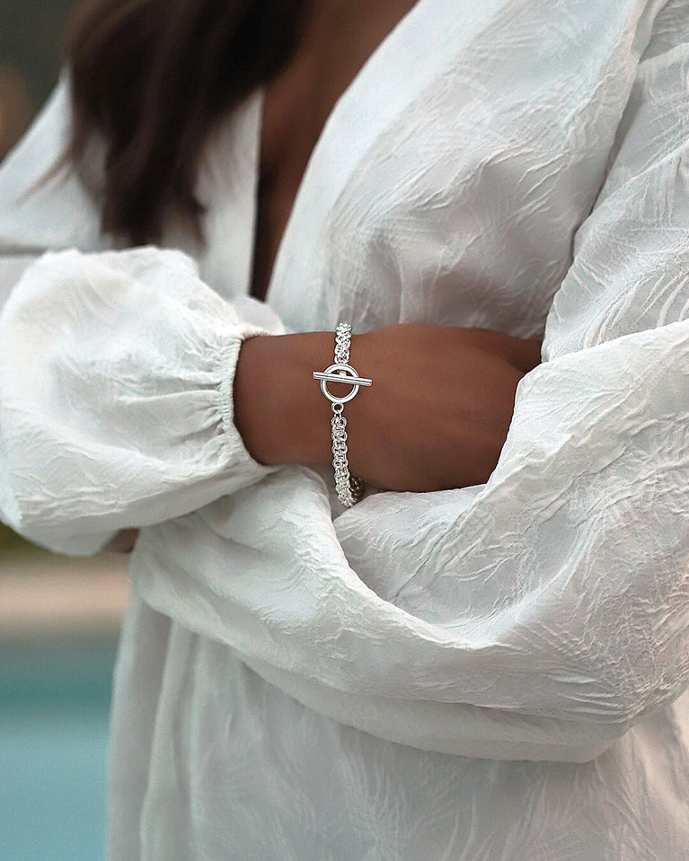 T-bar Chain Bracelet in Sterling Silver plated-316L stainless steel from Waldor & Co. The model is Avant Chain Polished.