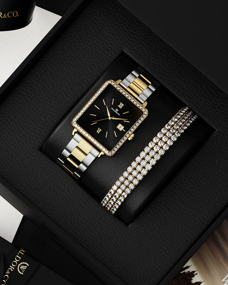 A 14k gold plated stainless steel chain in silver from Waldor & Co. One size. The model is Tennis Trio Chain Polished