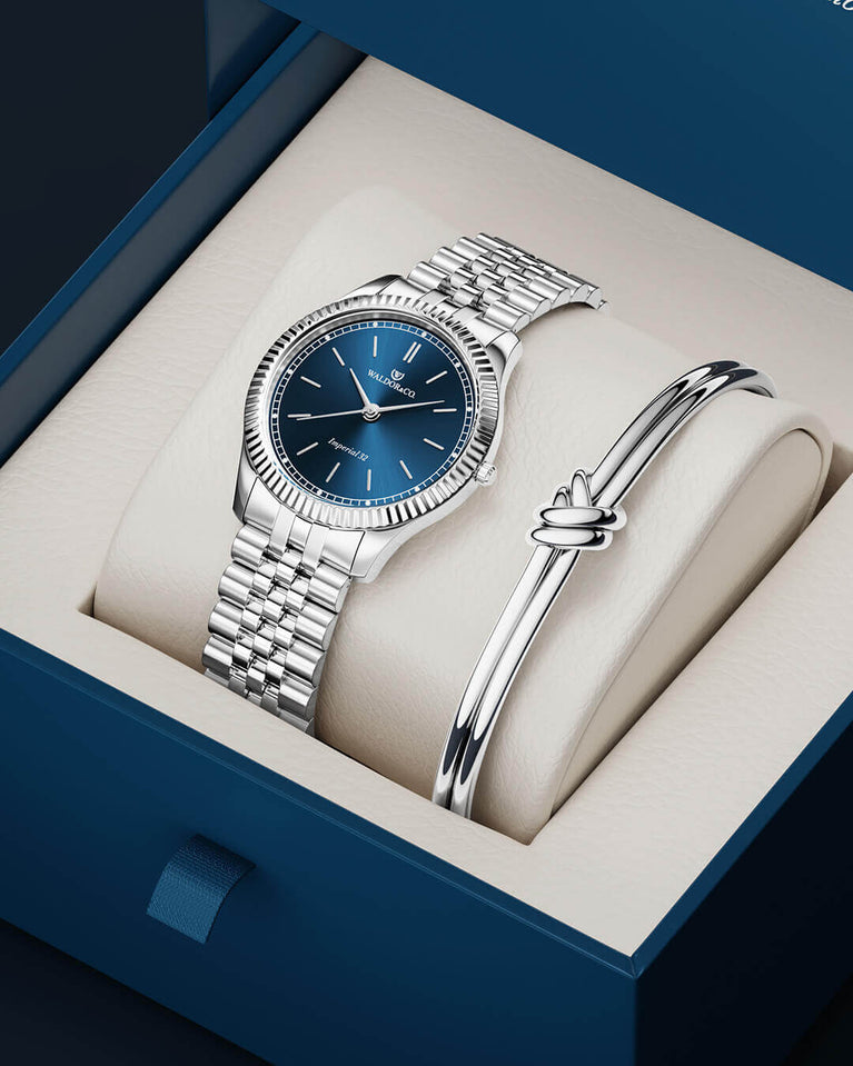 A round womens watch in silver from Waldor & Co. with blue sunray dial and a second hand. Seiko movement. The model is Imperial 32 Positano 32mm.